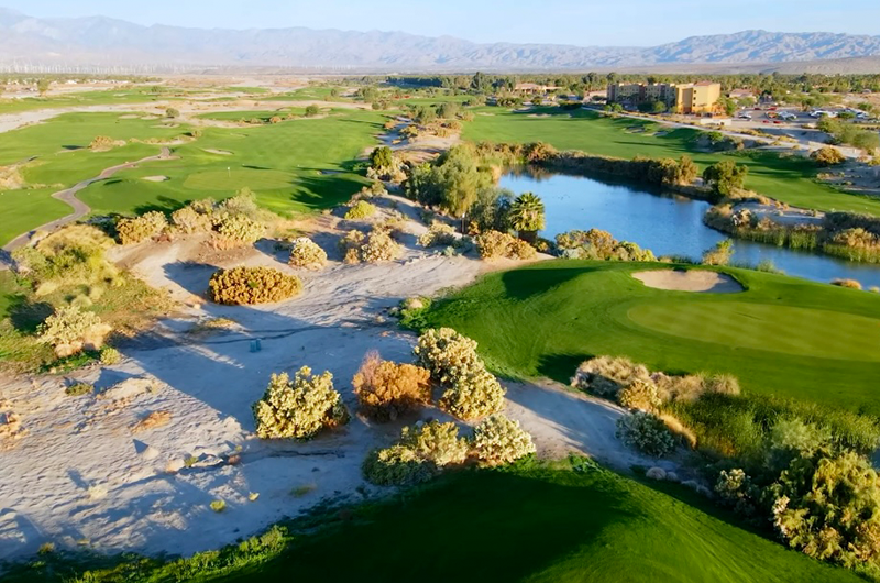 aerial view of golf course with sand trap