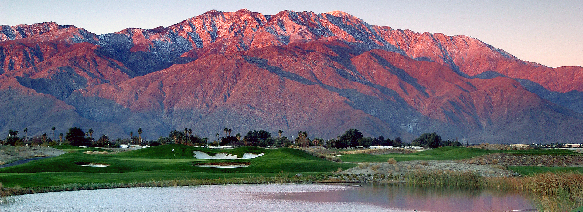view of golf course with mountains